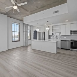 a kitchen with white cabinets