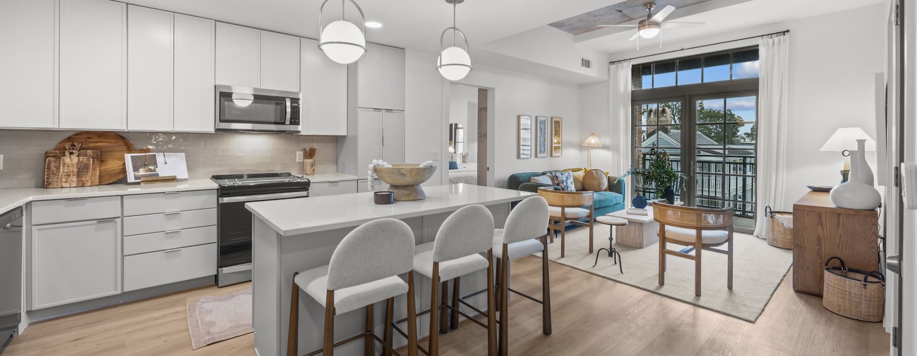 a kitchen with white cabinets